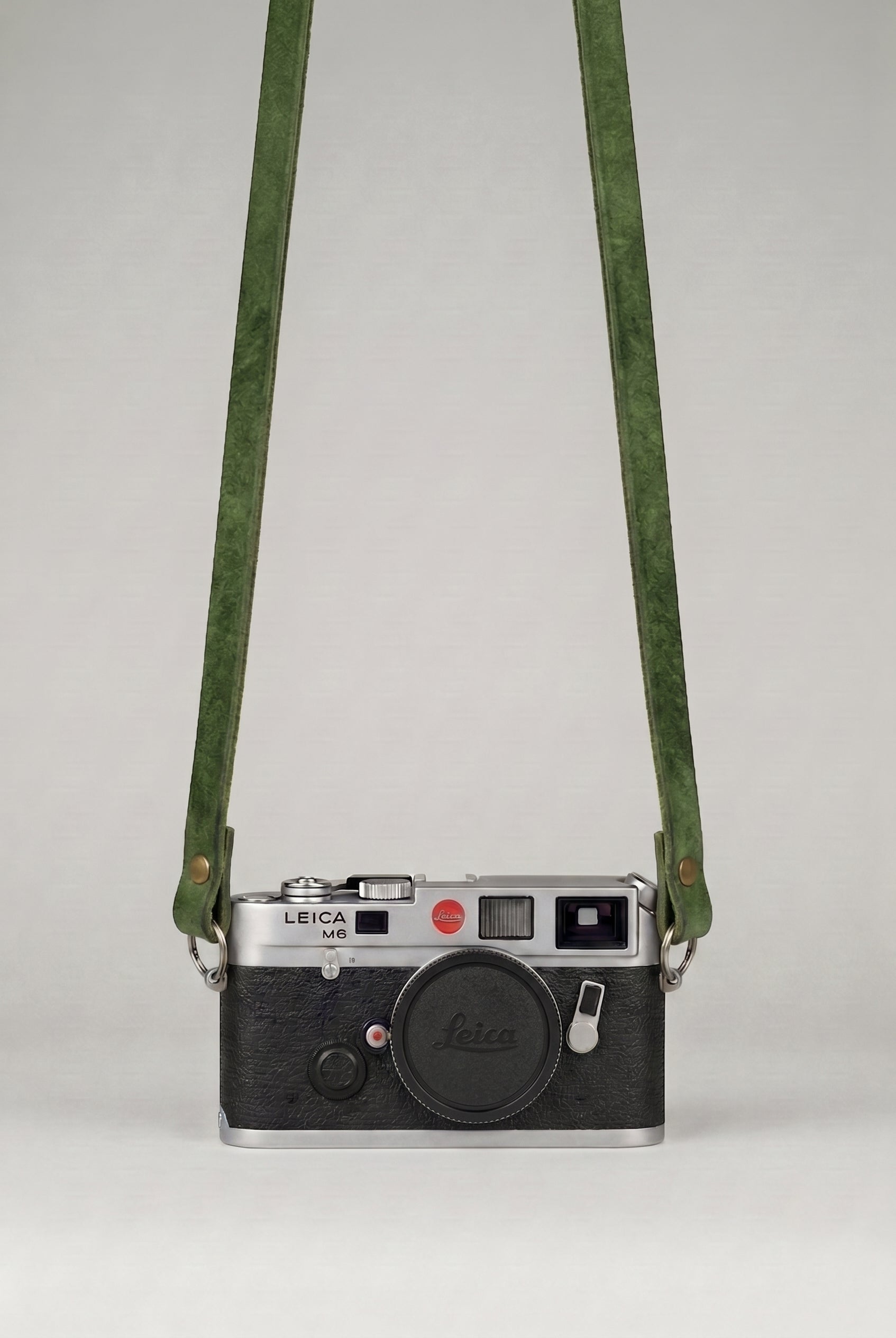 Tracolla in pelle verde leica